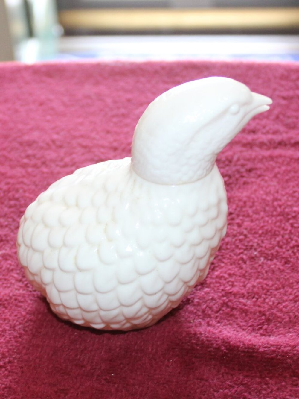 Vintage 1970s Avon milk glass cologne bottle shaped like a partridge